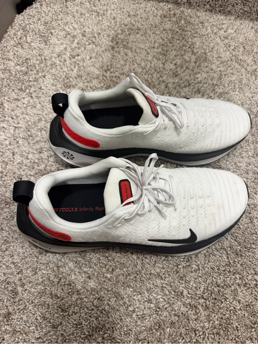 Nike Men’s White Athletic Running Shoes with Black and Red Accents